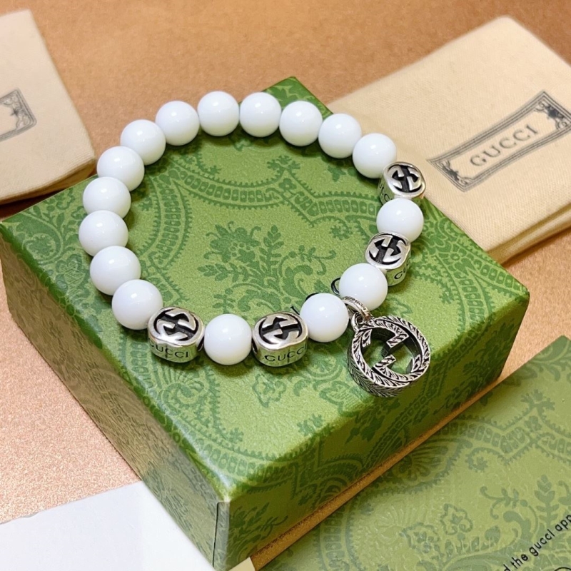 G*u*i bracelets